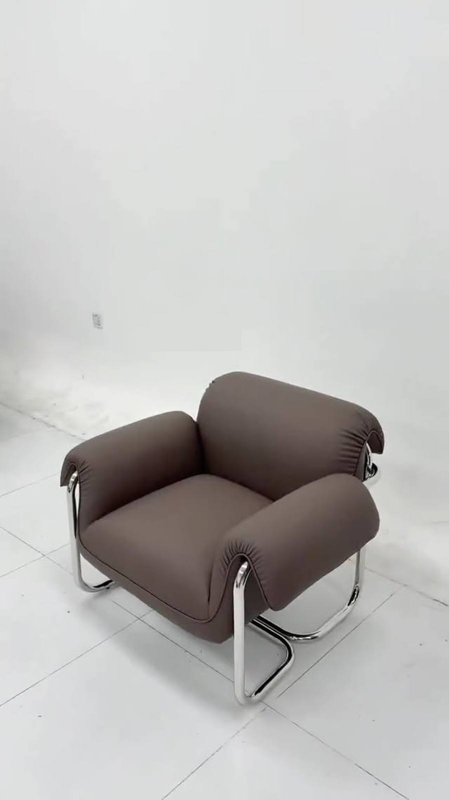 This armchair embodies timeless vintage luxury.