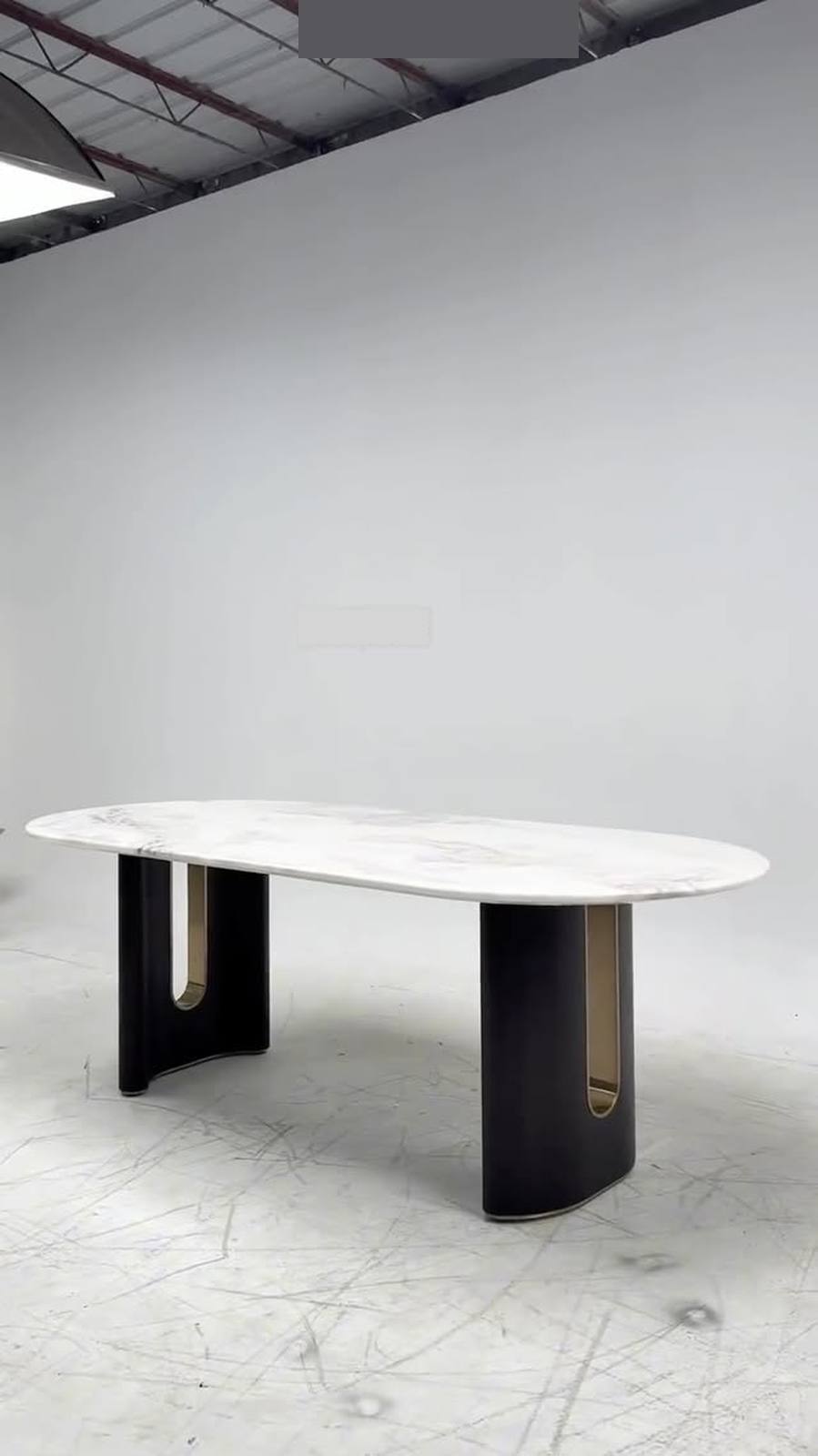 It opens in an industrial workshop where an
