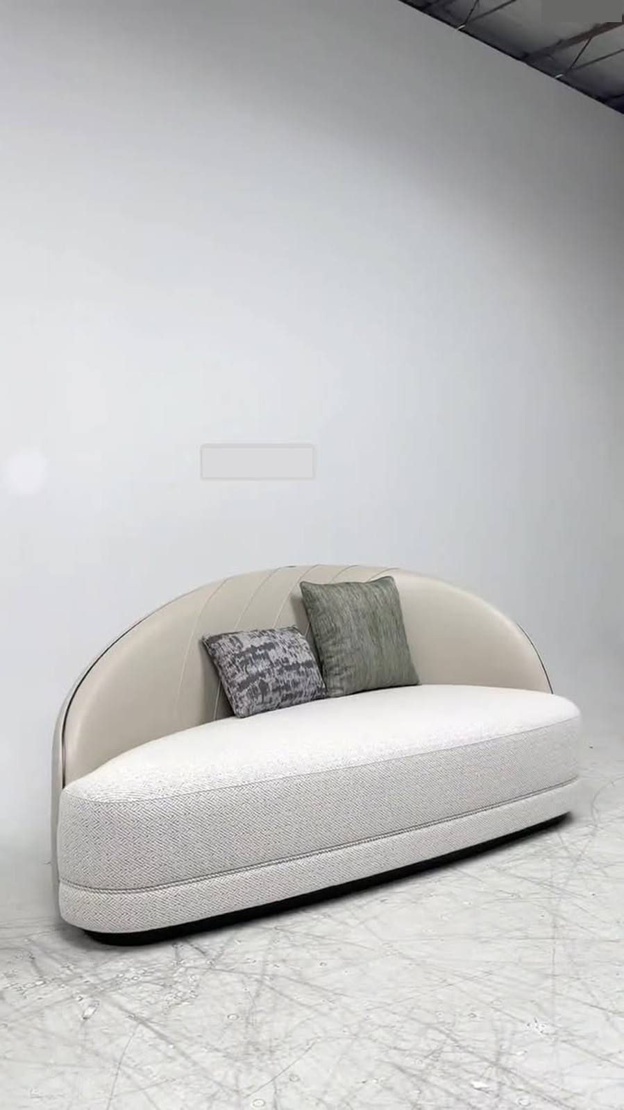 Perfect curved sofa solution for compact spaces.